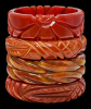 BB105 carved russet bakelite bangles